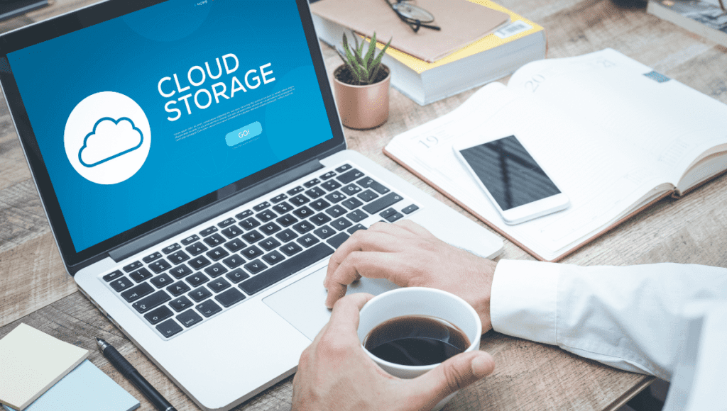 5 Small Business Cloud Storage Providers to Consider in 2023 3 A small business owner is utilizing a laptop with cloud storage for their data management.