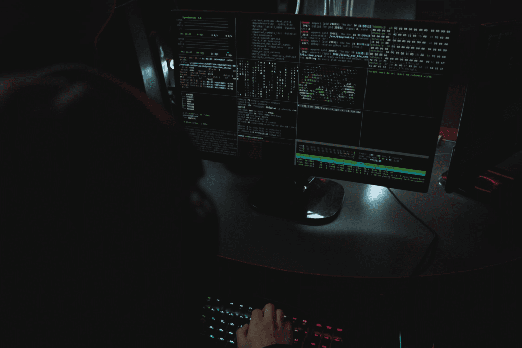 Understanding WordPress XML-RPC Attacks and How to Stop Them 2 A person using WordPress in the dark.
